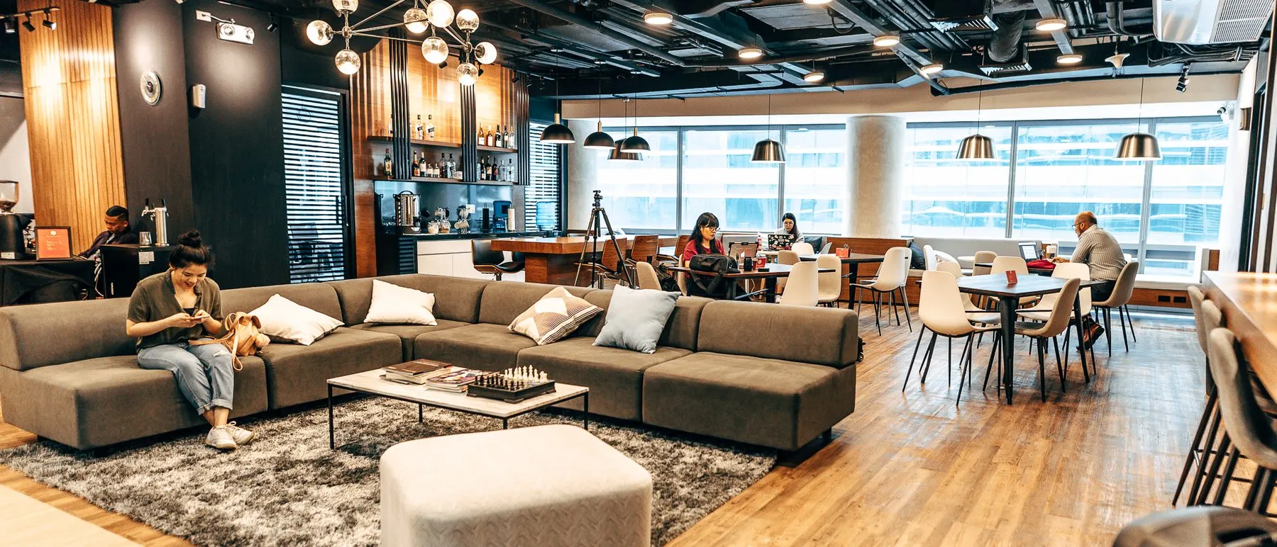 The Acceler8 Rockwell coworking floor with dedicated desks along the windows