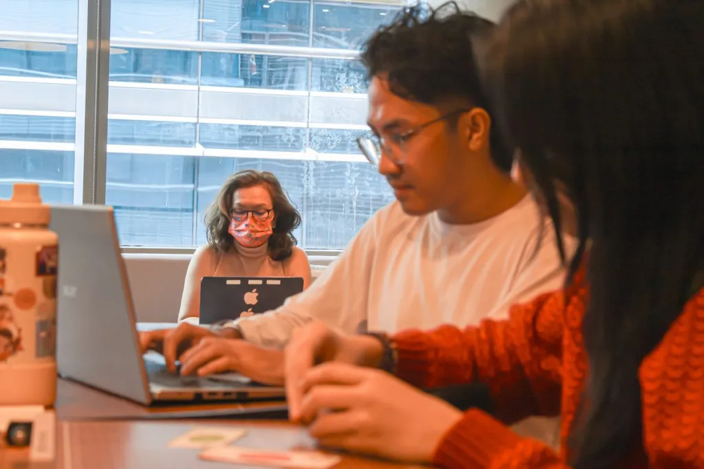 A member working at a dedicated desk at Acceler8 Rockwell