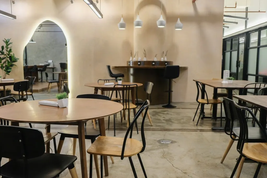 Work seating beside the arched windows at Acceler8 Legazpi