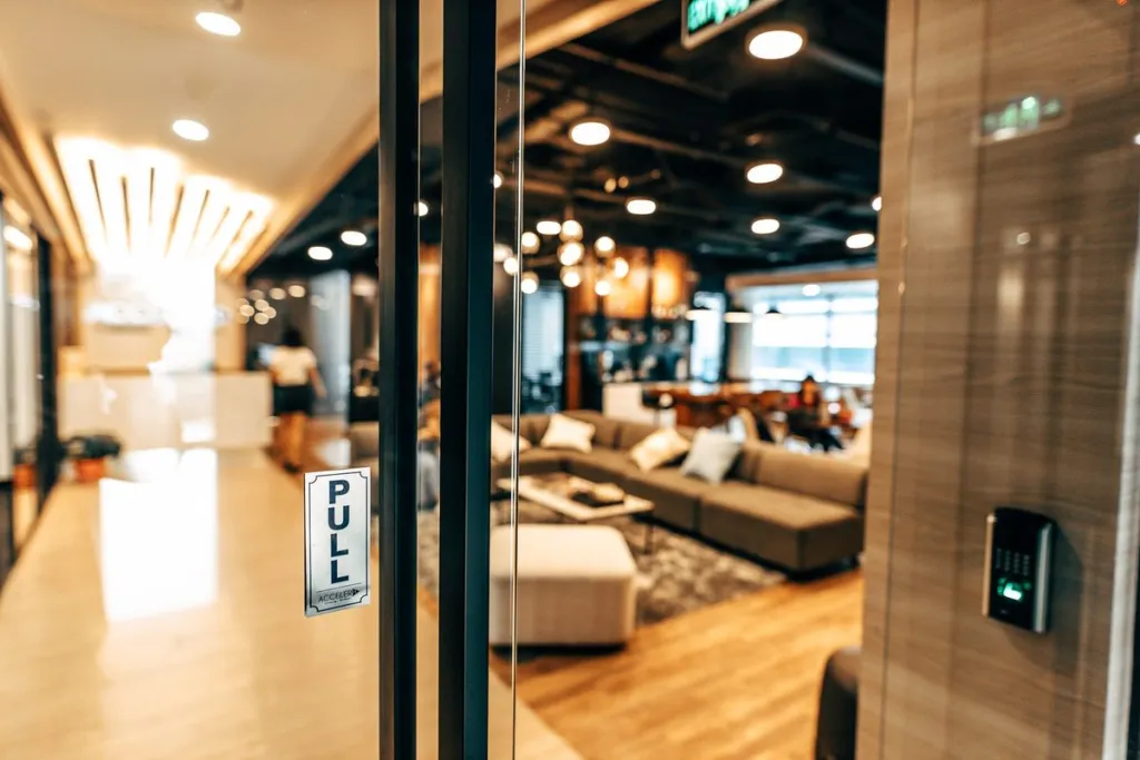 The members lounge at Acceler8, seen through the entrance door