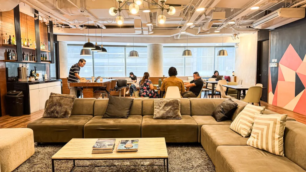 The Acceler8 Rockwell lounge with sofas and work tables by the windows